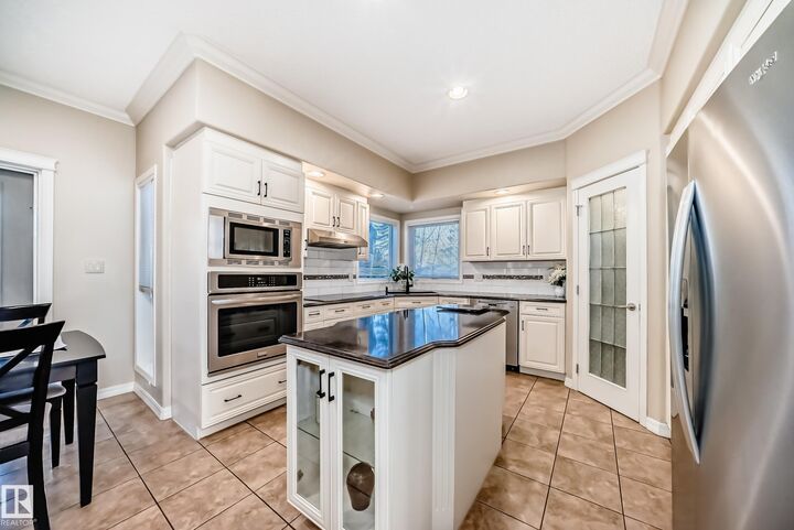 Property Photo:  203 Darlington Crescent NW  AB T6M 2T2 