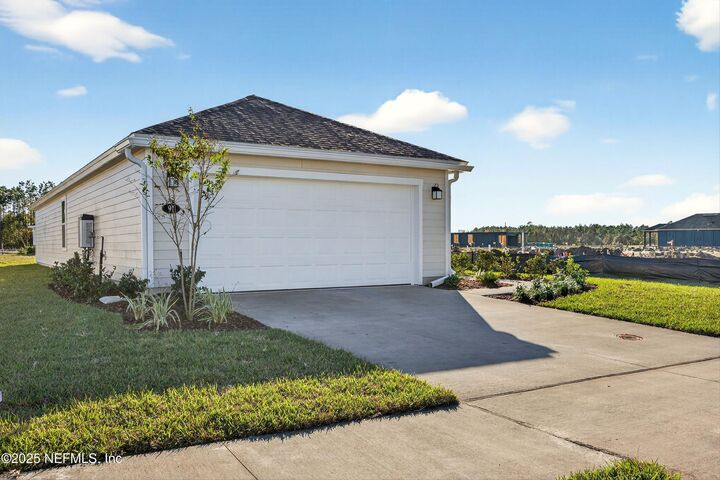 Property Photo:  91 Tea Olive Drive  FL 32137 