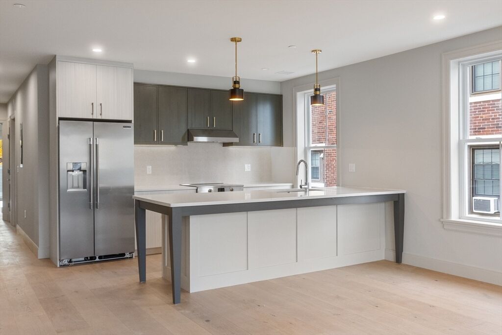 Property Photo:  59 Spear 202  MA 02169 