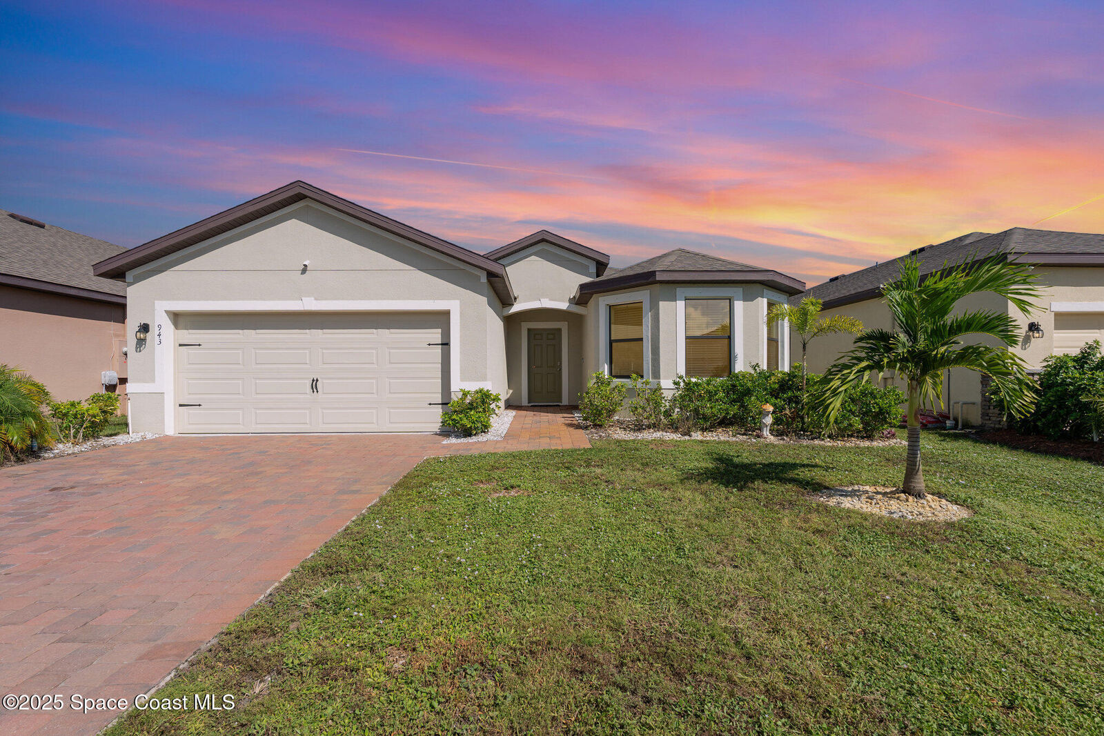 Property Photo: 943 Remington Green Drive SE FL 32909