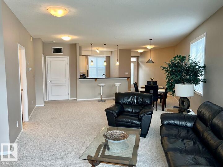 Property Photo: 9940 Sherridon Drive 400 AB T8L 4C9