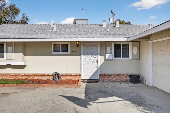Property Photo:  8261 Tanoak Way  CA 95621 