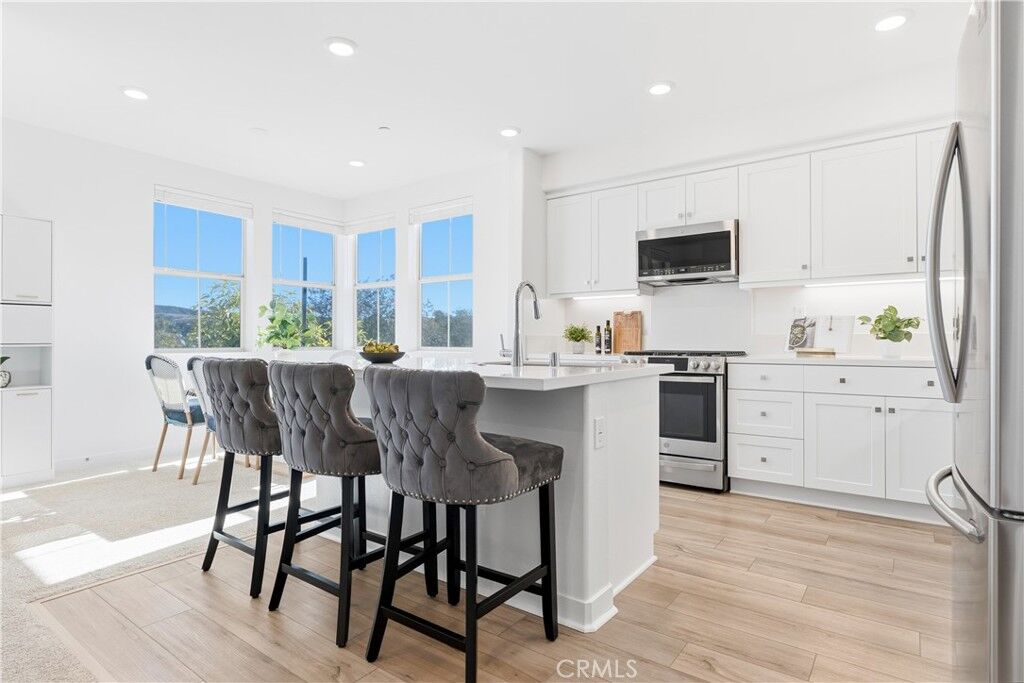Property Photo:  1500 Lasso Way 205  CA 92694 
