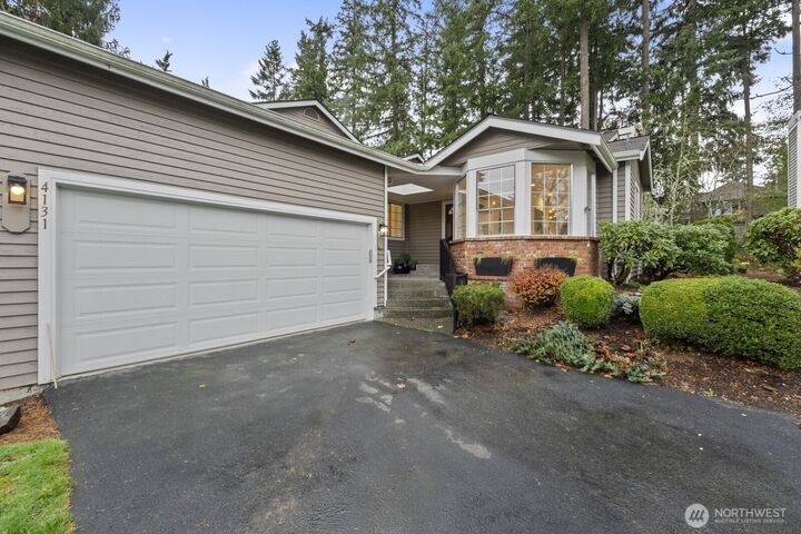 Property Photo:  4131  243rd Lane SE 18  WA 98029 