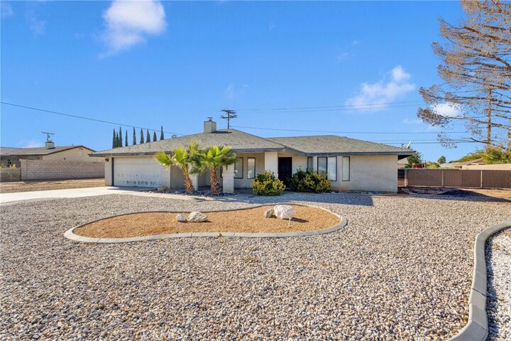 Property Photo:  13910 Rincon  CA 92307 