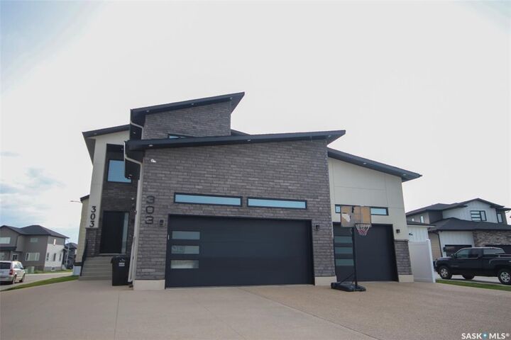 Property Photo: 131 Nazarali Way SK S7V 1X8