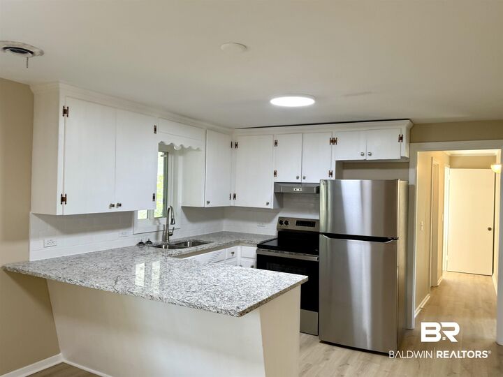 Property Photo:  201 S Stuart Street  AL 36535 