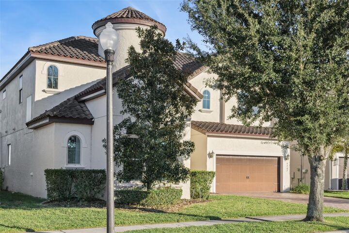 Property Photo: 9207 Busaco Park Way FL 34787