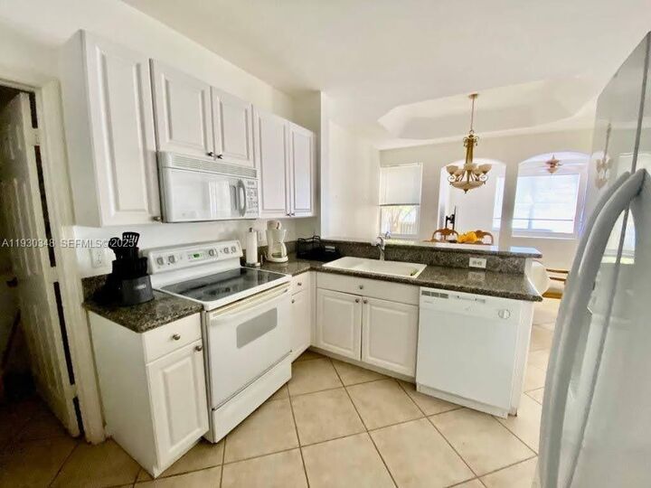 Property Photo: 6834 NW 107th Pl FL 33178