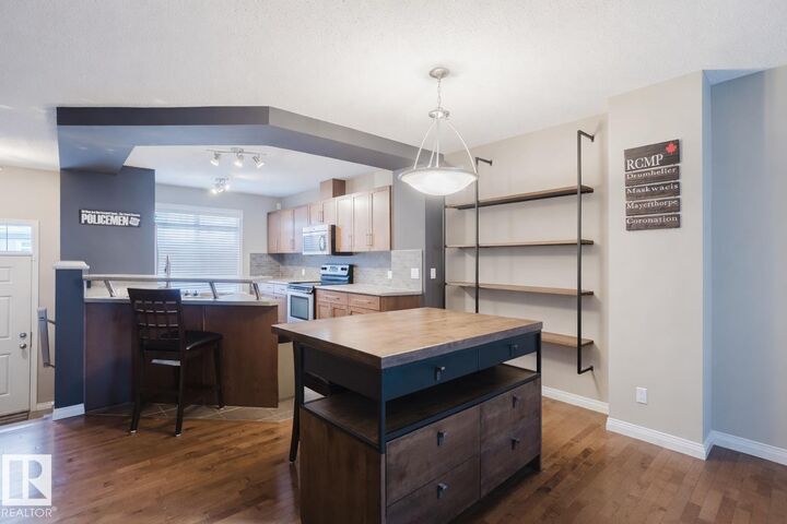 Property Photo:  1804 70 Street SW 81  AB T6X 0H4 