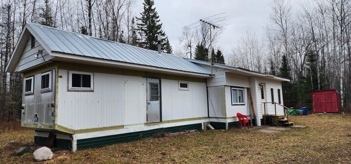 Property Photo: E5499 Taylor Rd MI 49774