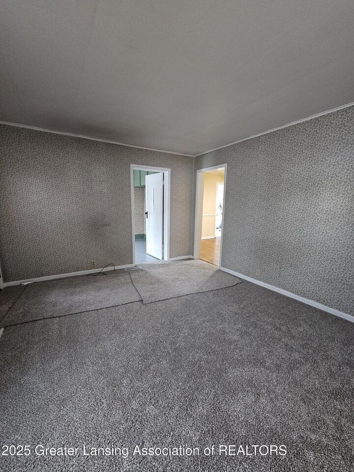 Property Photo:  414 Quarterline Street  MI 48875 