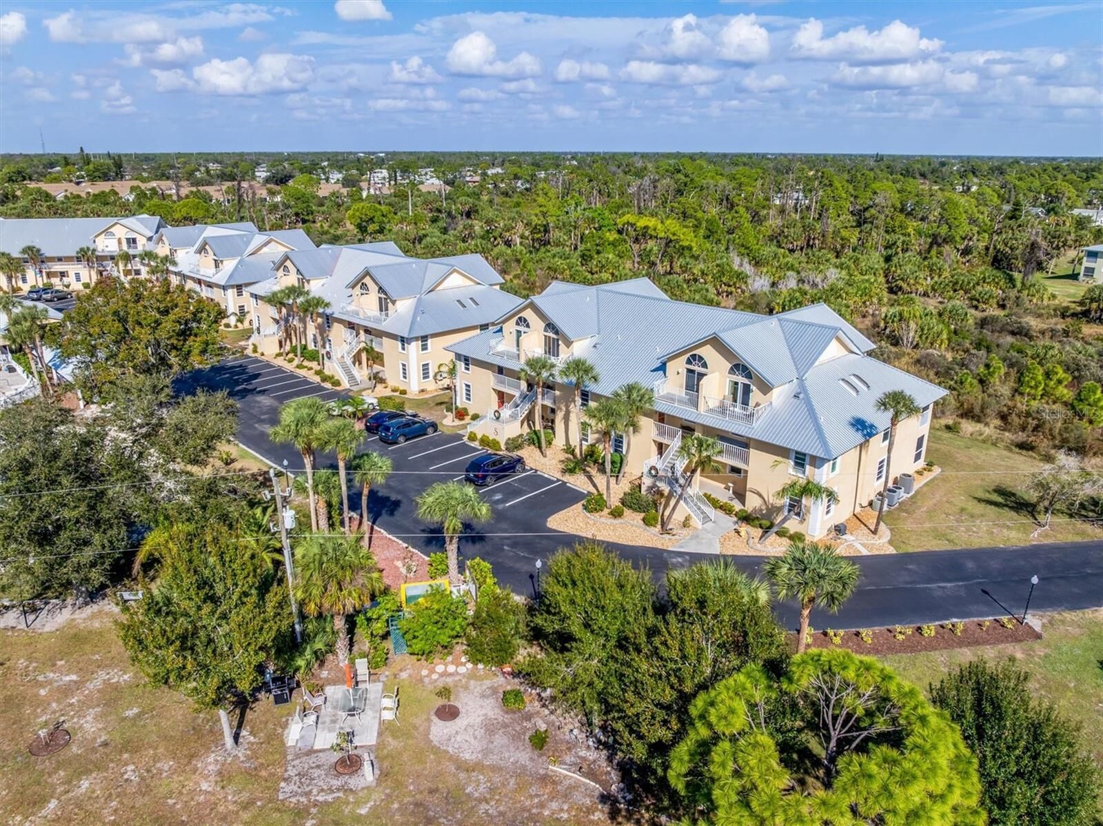Property Photo:  6610 Gasparilla Pines Boulevard 104  FL 34224 