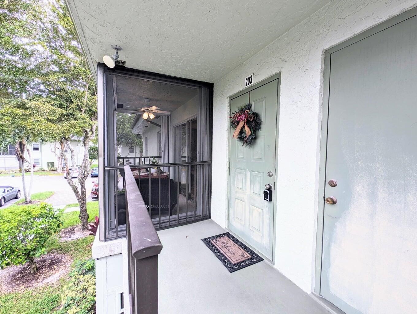 Property Photo:  7515 S Oriole Boulevard NW 203  FL 33446 