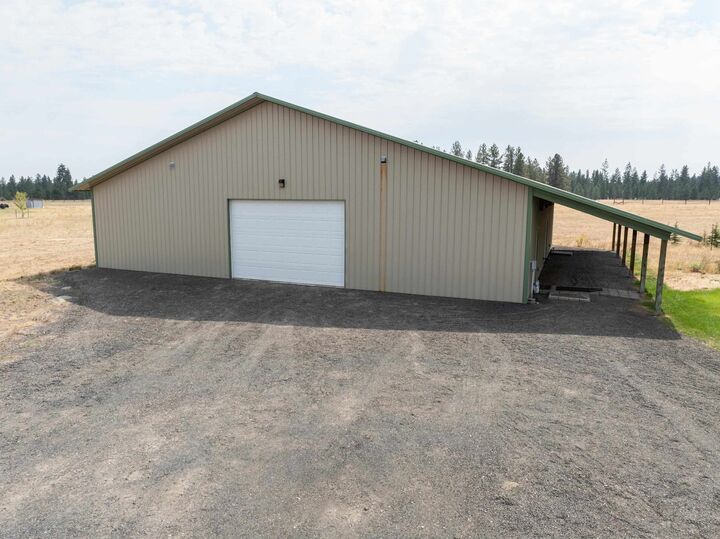 Property Photo:  9326 S Spotted Rd  WA 99004 