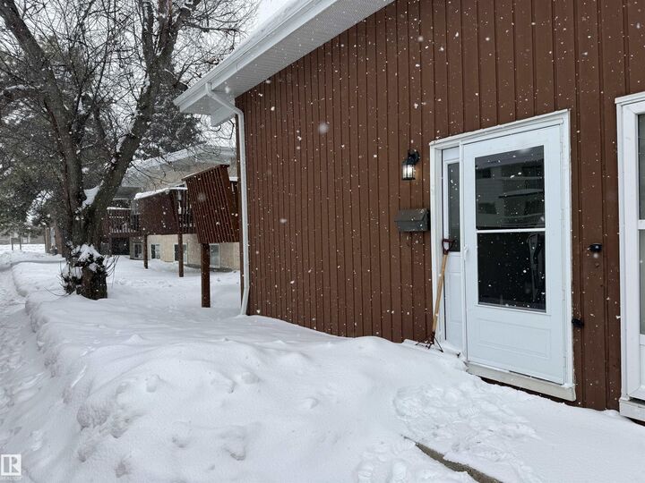 Property Photo:  8908 144 Avenue NW D  AB T5E 5V4 