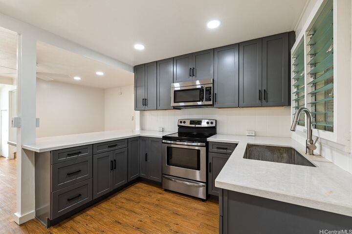 Property Photo:  163 Makaweo Avenue A-1  HI 96786 