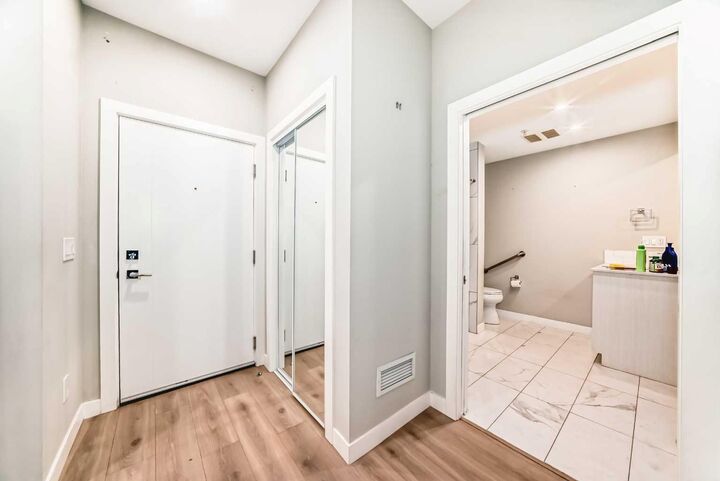 Property Photo:  383 Smith Street NW 119  AB T3B 6J9 