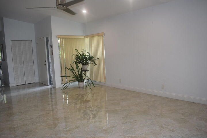 Property Photo:  5700 Queen Palm Court A  FL 33484 