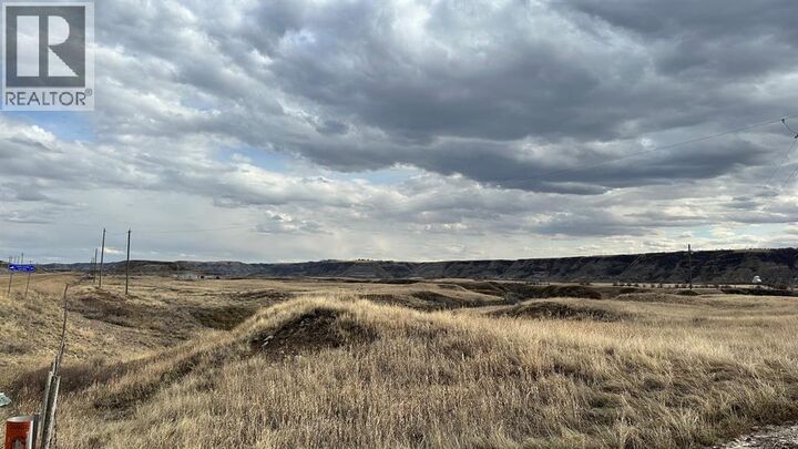 Property Photo:  838 North Dinosaur Trail  AB T0J 0Y1 