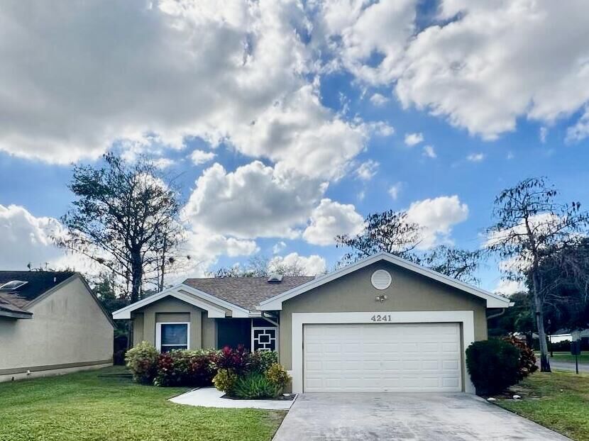 Property Photo:  4241 Green Forest Way  FL 33436 