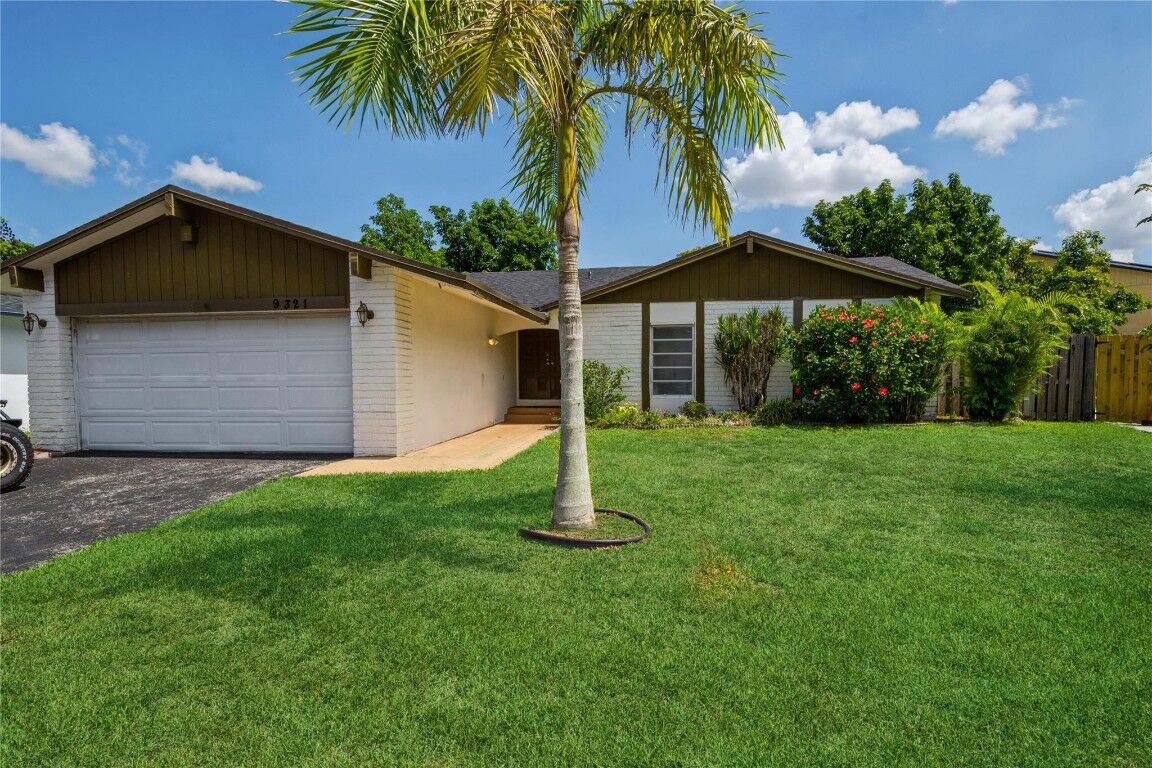 Property Photo: 9321 NW 38th Place FL 33351