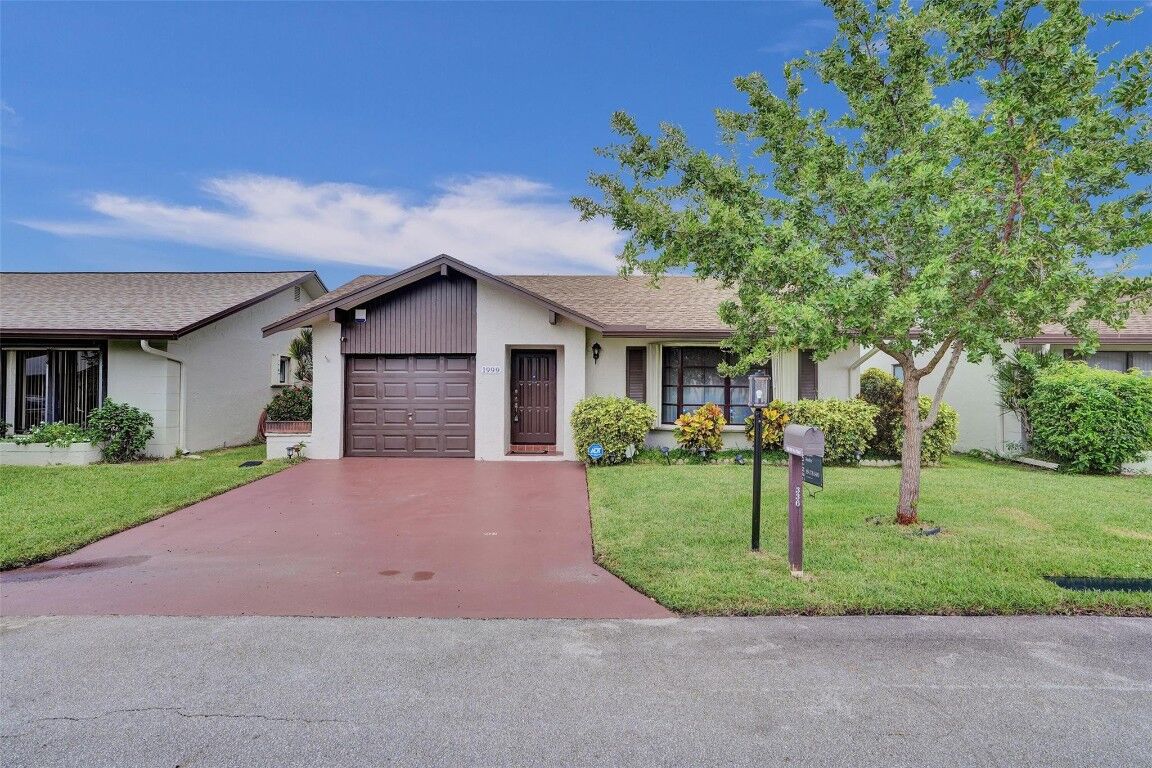 Property Photo:  1999 SW 16th Place  FL 33442 