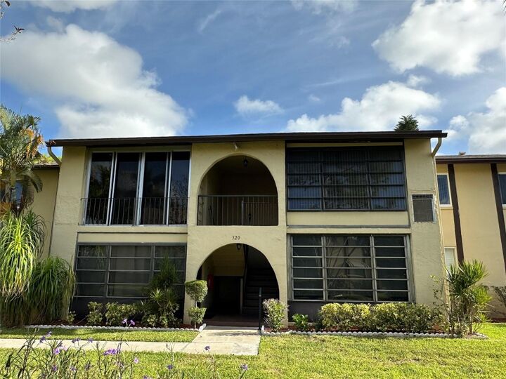 Property Photo: 320 Pine Ridge Circle B2 FL 33463