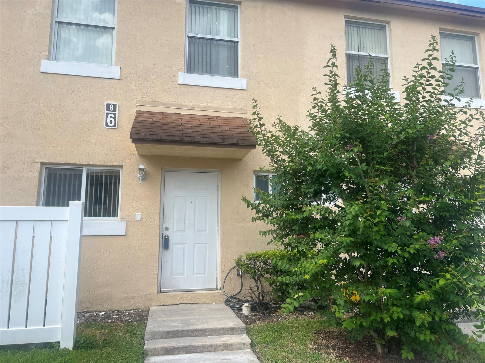 Property Photo:  6615 Winfield Boulevard 6-8  FL 33063 
