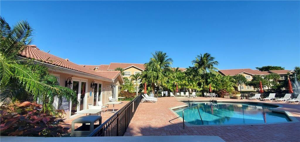 Property Photo:  8977 Wiles Road 206  FL 33067 