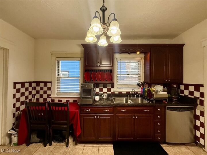 Property Photo:  15220 Lucknow Avenue  OH 44110 