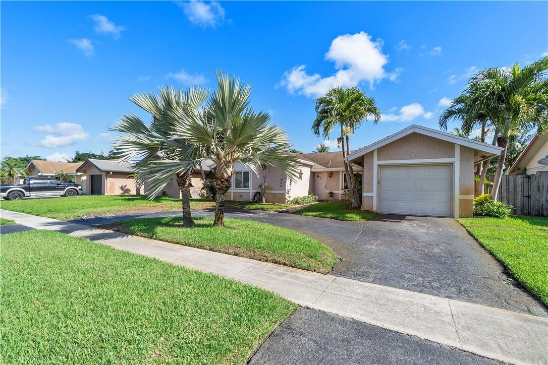 Property Photo:  8203 SW 12th Street  FL 33068 
