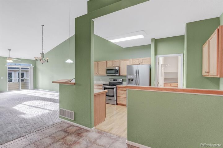 Property Photo:  6656 S Reed Way B  CO 80123 