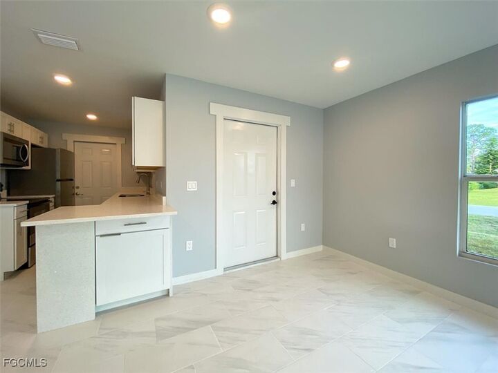 Property Photo: 2401-2403 Joe Avenue S FL 33973