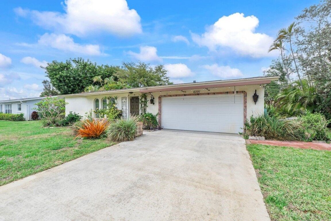 Property Photo:  6391 Sagewood Way  FL 33484 