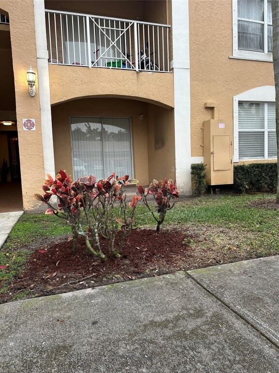 Property Photo:  5590 NW 61st Street 803  FL 33073 