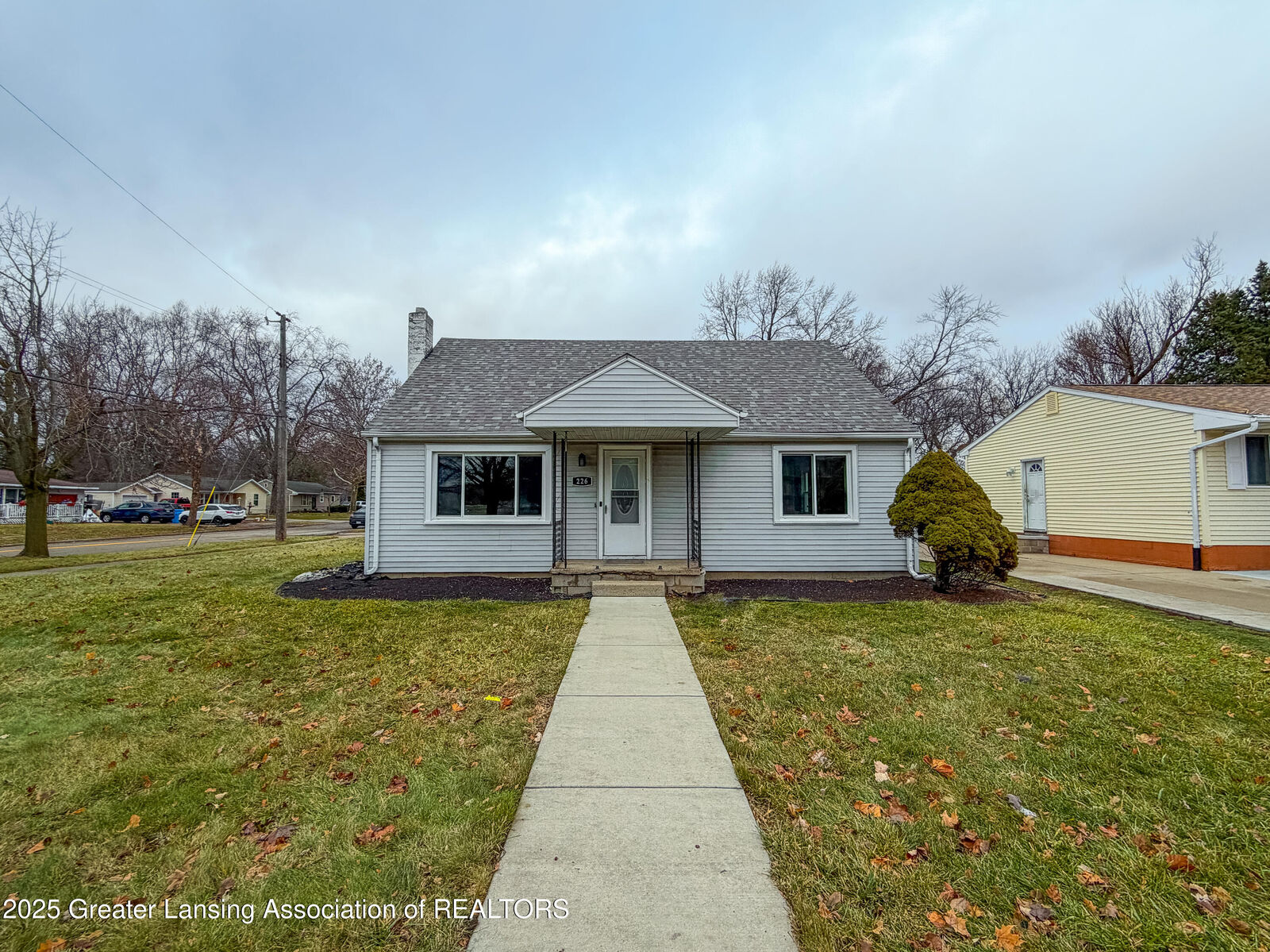 Property Photo:  226 W Jolly Road  MI 48910 