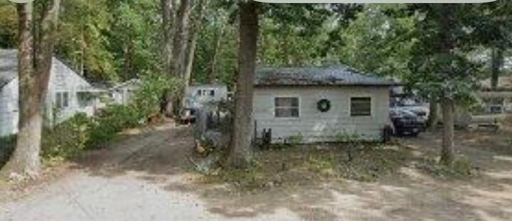 Property Photo:  116 Burrill Drive  MI 48651 