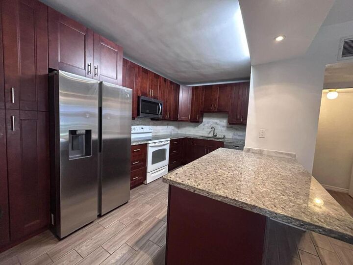 Property Photo:  2700 S University Drive 7B  FL 33328 