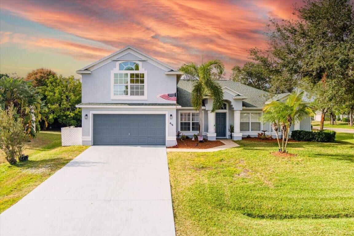 Property Photo: 414 SE Cork Road FL 34984