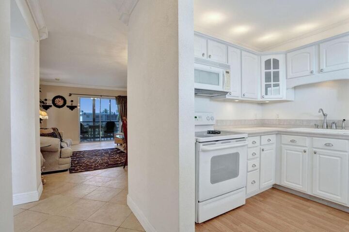 Property Photo:  2669 S Garden Drive 401  FL 33461 