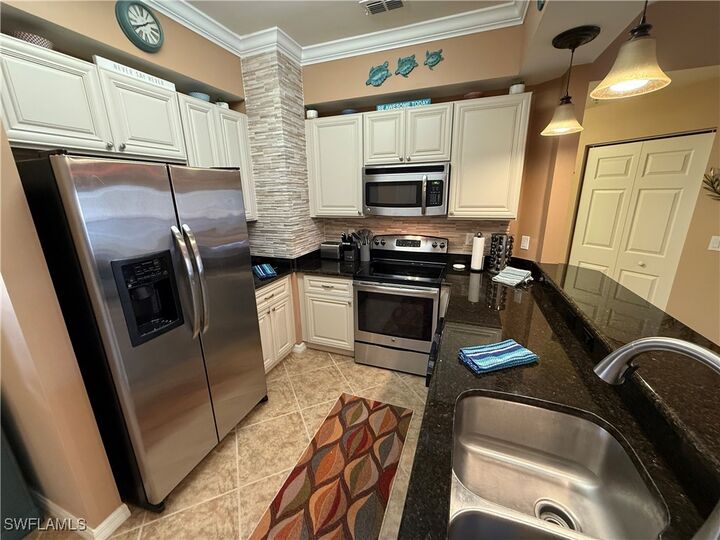 Property Photo:  1076 Winding Pines Circle 203  FL 33909 