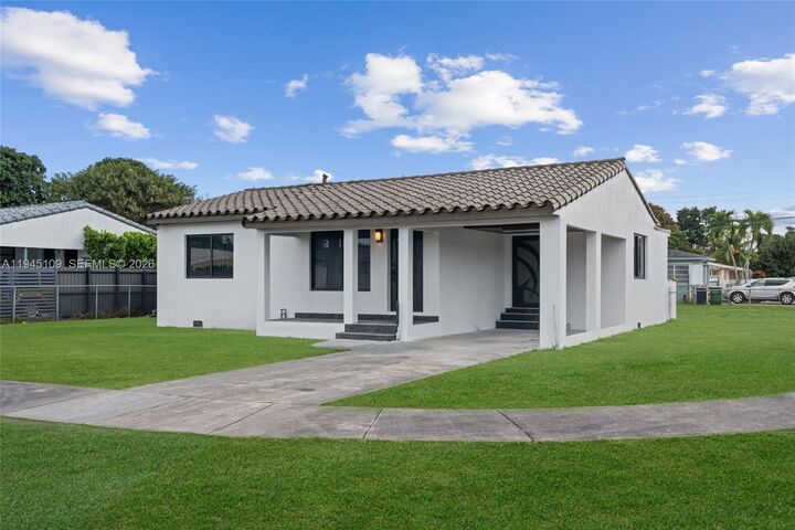 Property Photo:  3030 NW 99th St  FL 33147 