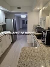 Property Photo:  12701 SW 14th St 312J  FL 33027 