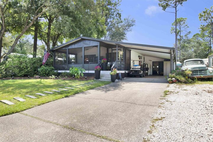 Property Photo: 1661 Spanish Cove Drive AL 36549