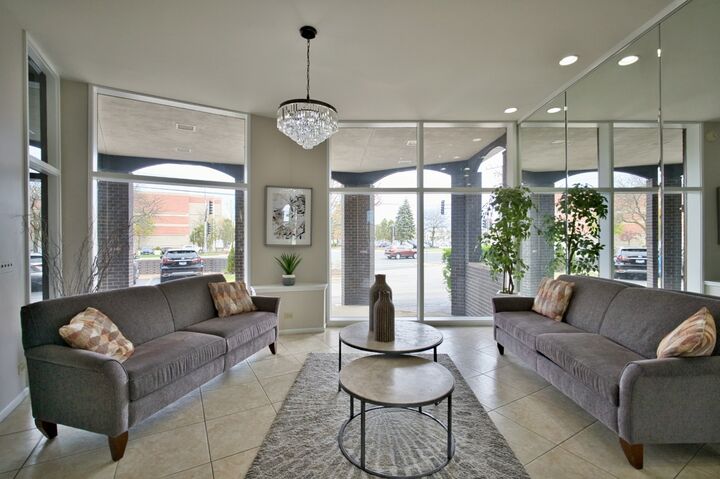 Property Photo: 4901 Golf Road 310 IL 60077