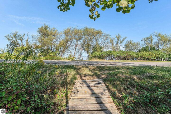 Property Photo:  12016 Peninsula Drive  MI 49686 