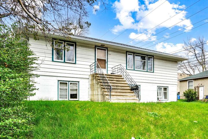 Property Photo:  112 29 Avenue NW  AB T2M 2L8 