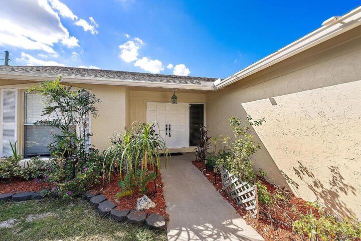 Property Photo:  1199 Jackpine Street  FL 33414 