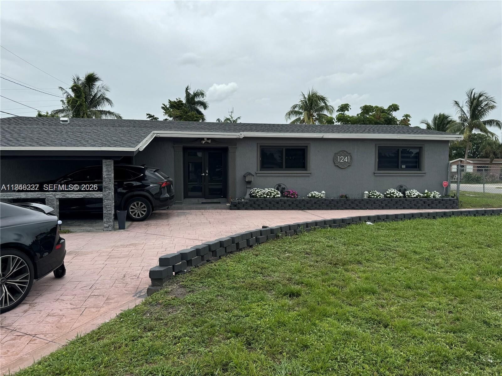 Property Photo:  1241 NW 196th St  FL 33169 